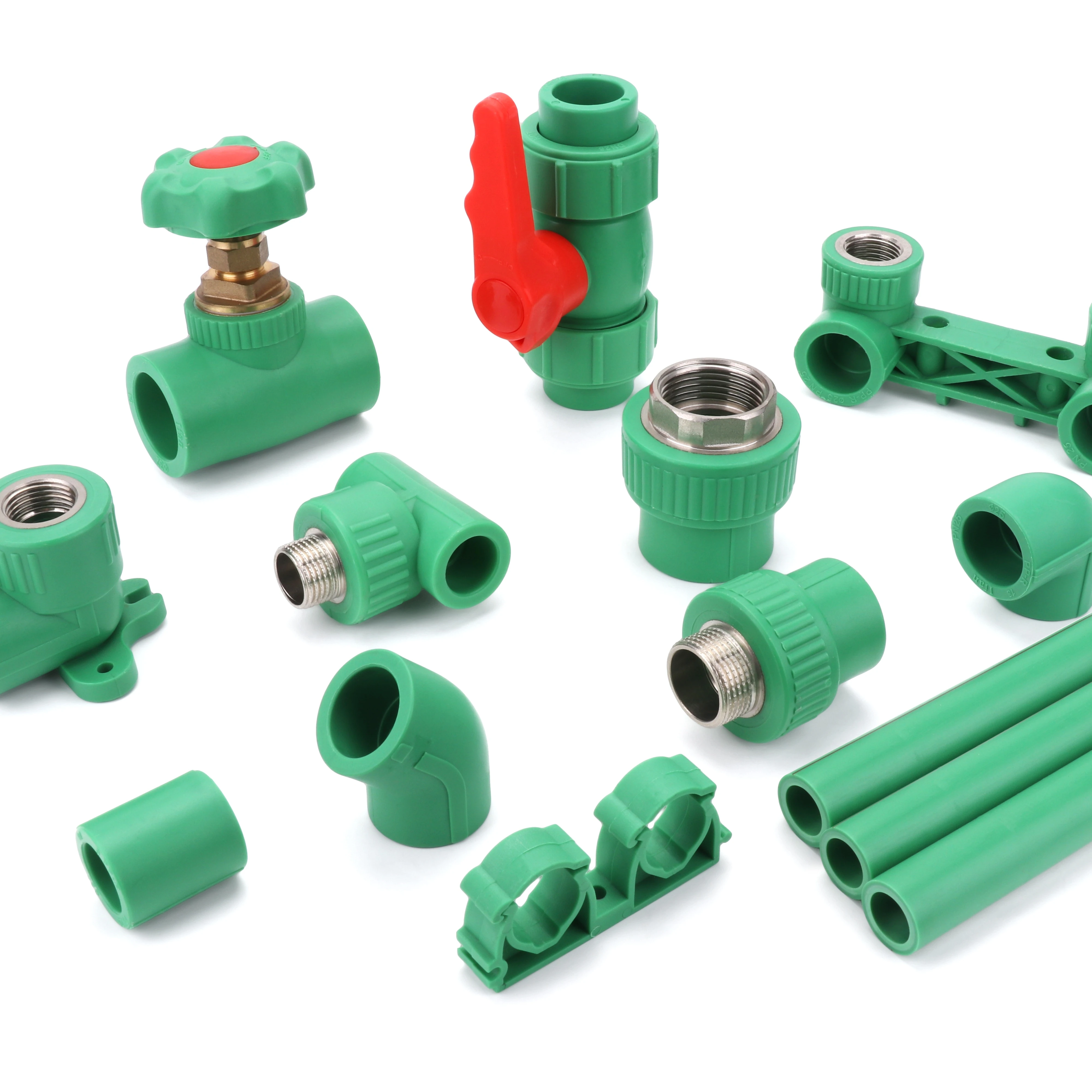 Close-up of PPR fittings including brass-insert threaded adapters, elbows, tees, a ball valve and pipe clips